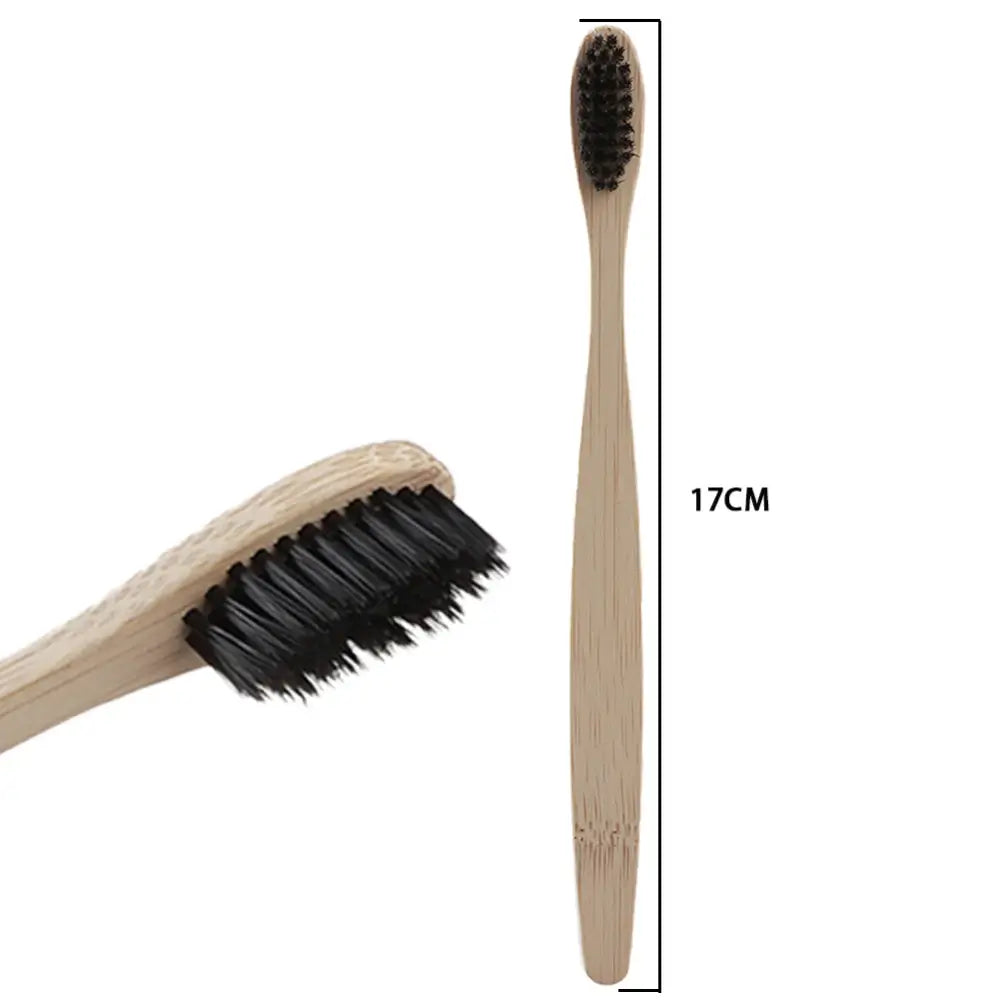 The black bamboo toothbrush showing its height of 17cm. A close up of the Eco-friendly black bristles 
