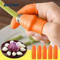 The knife finger protector set being used to cut a green bean. A place with garlic being displayed in the bottom left corner as well as 5 finger protectors.
