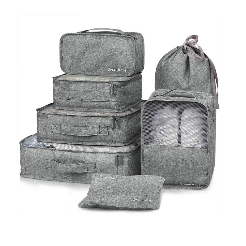 Travel Storage Bags Set, 7 pieces in Gray with a white background.
